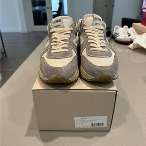 Golden Goose running sole. Size 39. Comes with box. Excellent condition.